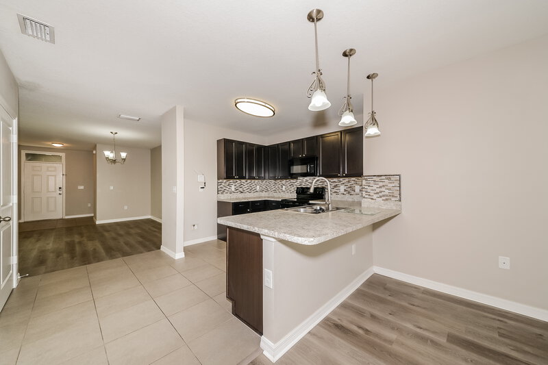 2,095/Mo, 10126 Geese Trail Cir Sun City Center, FL 33573 Kitchen View 2