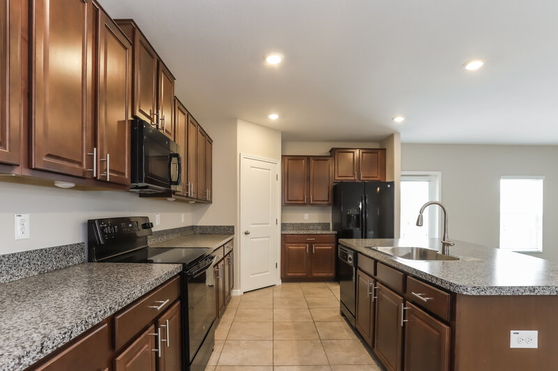 3,680/Mo, 15420 Dark Star Ln Sun City Center, FL 33573 Kitchen View 2