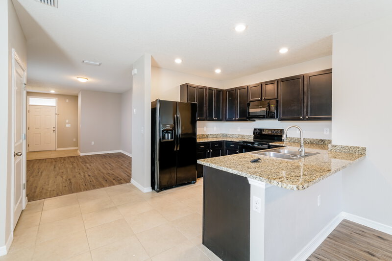 2,310/Mo, 32667 Dashel Palm Ln Wesley Chapel, FL 33543 Kitchen View 2