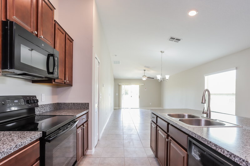 1,970/Mo, 4252 Unbridled Song Dr Sun City Center, FL 33573 Kitchen View 2