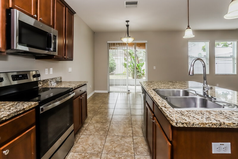 1,865/Mo, 916 Parker Den Dr Ruskin, FL 33570 Kitchen View 2
