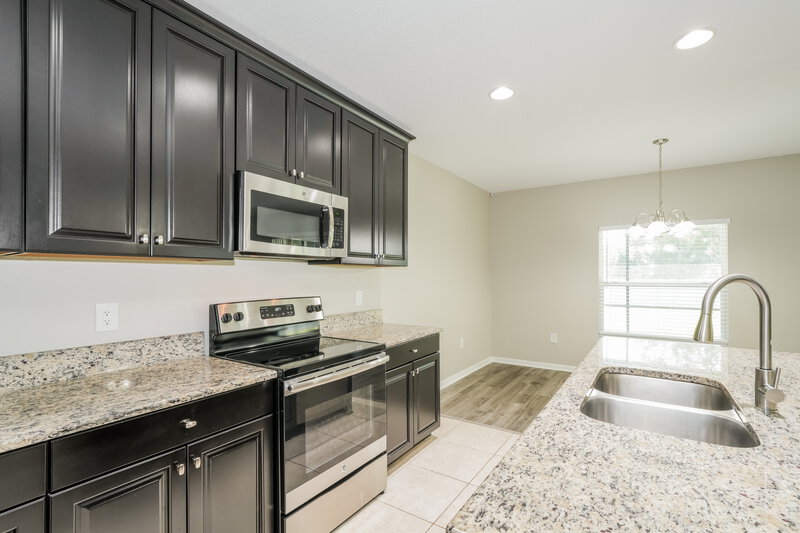 1,975/Mo, 12452 Chaya Ct Spring Hill, FL 34610 Kitchen View 3