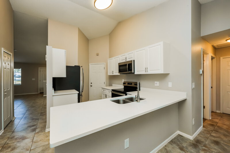 2,025/Mo, 213 Belfort Pl Valrico, FL 33594 Kitchen View 2