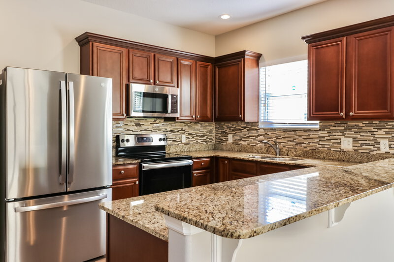 2,410/Mo, 3832 Langdrum Dr Wesley Chapel, FL 33543 Kitchen View 2