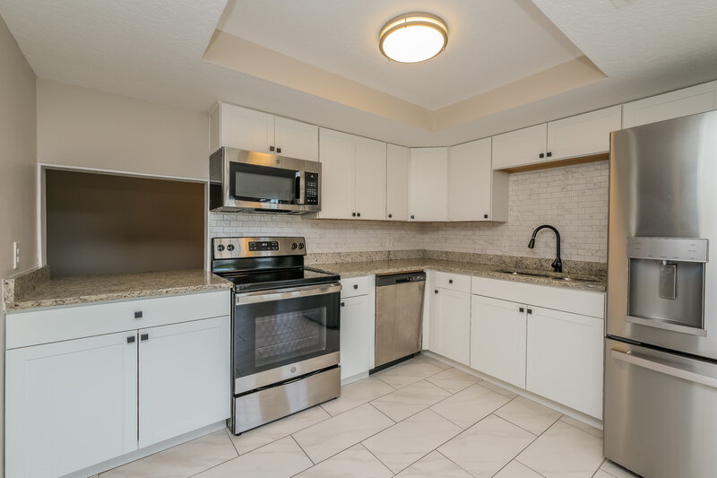 1,960/Mo, 7629 Bramblewood Dr Port Richey, FL 34668 Kitchen View