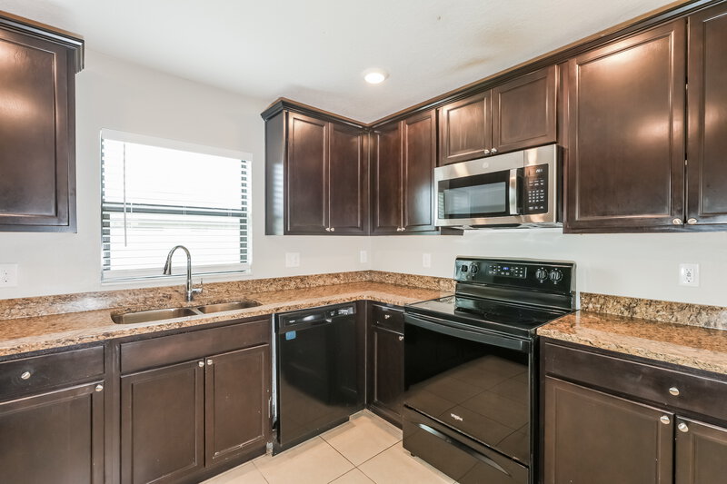 1,980/Mo, 1714 Chatham Green Cir Ruskin, FL 33570 Kitchen View 2