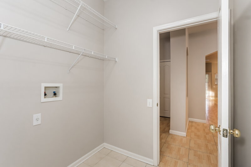 1,895/Mo, 5103 Gato del Sol Cir Wesley Chapel, FL 33544 Laundry Room View