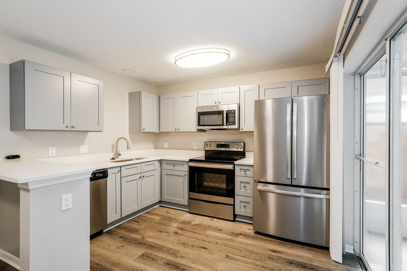 3,590/Mo, 1424 Dew Bloom Rd Valrico, FL 33594 Kitchen View