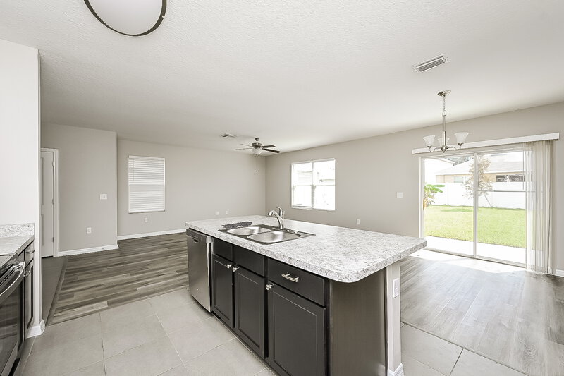 4,040/Mo, 10117 Mangrove Well Rd Ruskin, FL 33573 Kitchen View 2