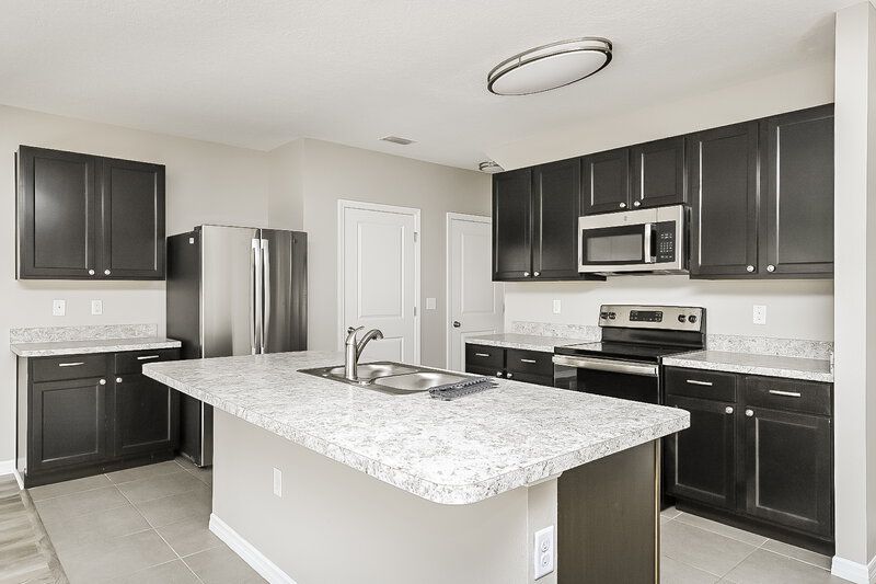4,040/Mo, 10117 Mangrove Well Rd Ruskin, FL 33573 Kitchen View 3