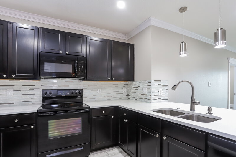 1,970/Mo, 10236 Mangrove Well Rd Sun City Center, FL 33573 Kitchen View 2