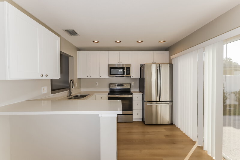 1,905/Mo, 14148 Lemon Yellow Tree Ln Spring Hill, FL 34613 Kitchen View 2