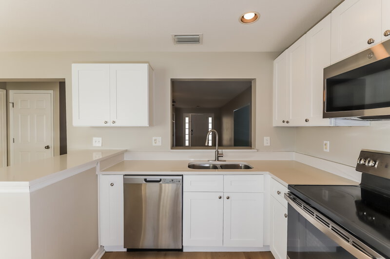 1,905/Mo, 14148 Lemon Yellow Tree Ln Spring Hill, FL 34613 Kitchen View 3