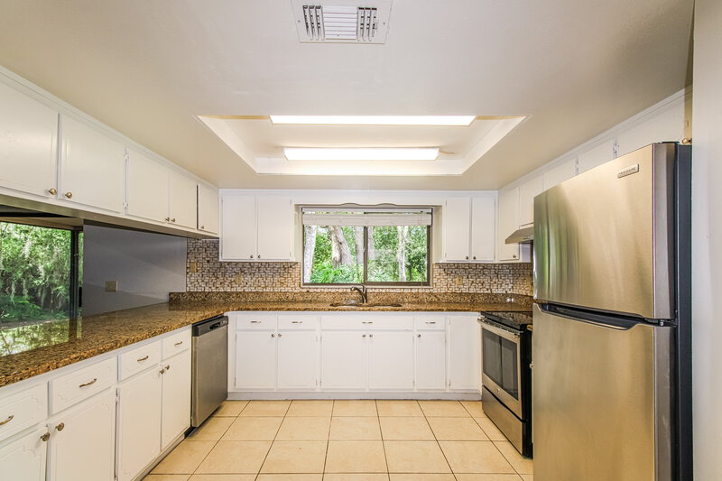 1,860/Mo, 8499 Vicksburg Rd Spring Hill, FL 34608 Kitchen View 2