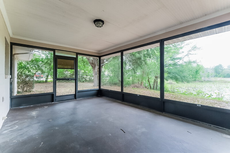 1,750/Mo, 7332 Glen Cove Rd Weeki Wachee, FL 34613 Sun Room View