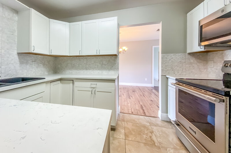 1,845/Mo, 4459 Springwood Rd Spring Hill, FL 34609 Kitchen View 3