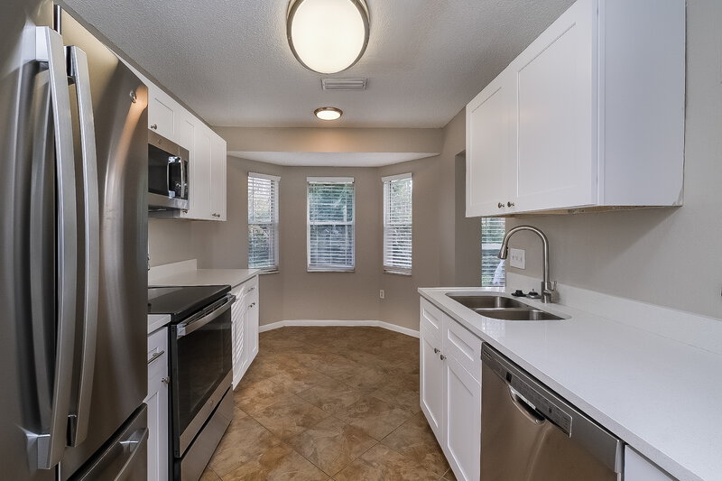 1,945/Mo, 10950 Kenmore Dr New Port Richey, FL 34654 Kitchen View 2