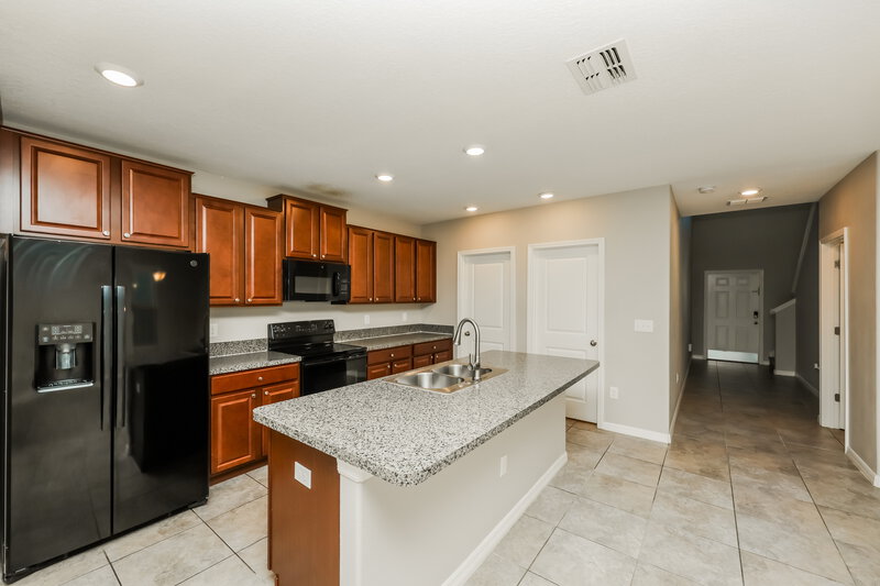 2,465/Mo, 15425 Broad Brush Dr Ruskin, FL 33573 Kitchen View 2