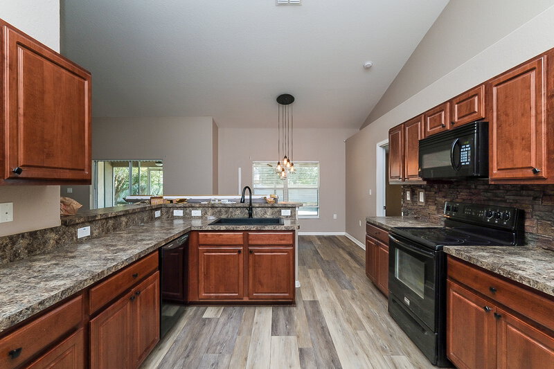 2,460/Mo, 1020 Godfrey Ave Spring Hill, FL 34609 Kitchen View