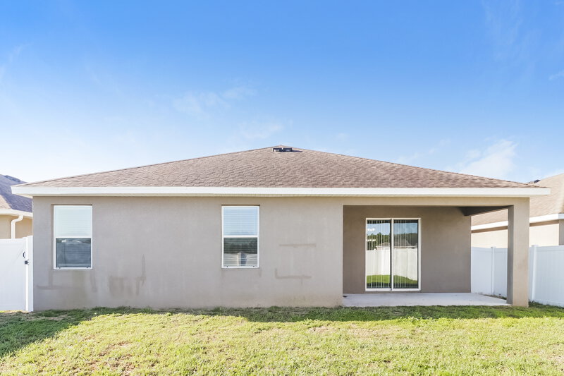 2,200/Mo, 30745 Water Lily Dr Brooksville, FL 34602 Rear View 2