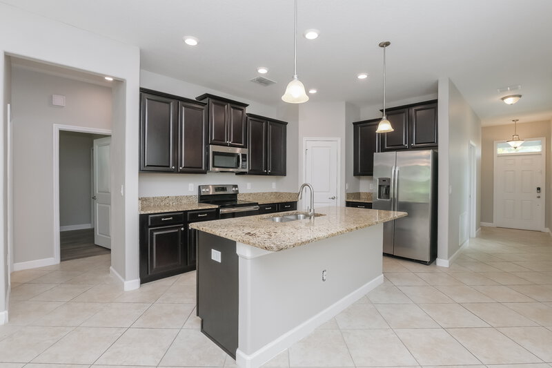 1,990/Mo, 10167 Newminster Loop Ruskin, FL 33573 Kitchen View 2