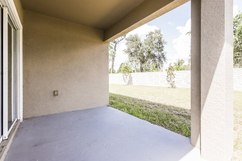 2,375/Mo, 16471 Little Garden Dr Wimauma, FL 33598 Covered Patio View