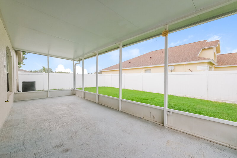2,525/Mo, 1046 Crimson Clover Ln Zephyrhills, FL 33543 Screen Porch View