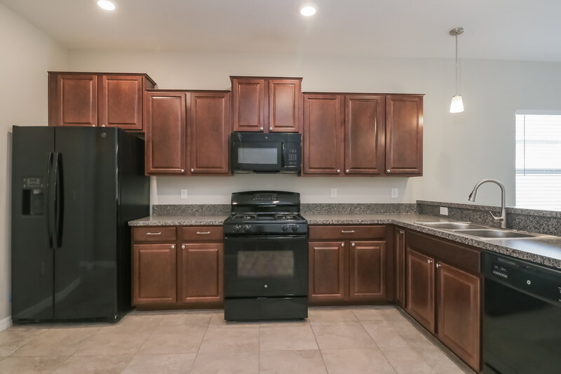 2,625/Mo, 8724 Forget Me Not Ct Land O Lakes, FL 34637 Kitchen View 2