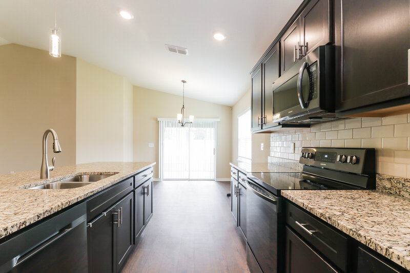 2,485/Mo, 6784 Hanworth Ln Zephyrhills, FL 33541 Kitchen View 2