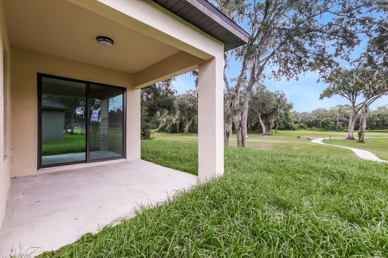 2,470/Mo, 7014 Redbay Dr Brooksville, FL 34602 Rear View 2