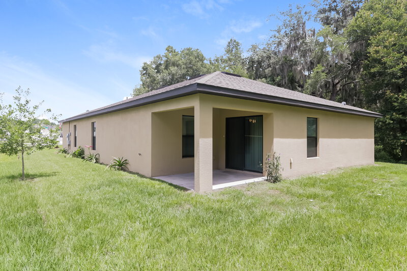 3,950/Mo, 7014 Redbay Dr Brooksville, FL 34602 Rear View