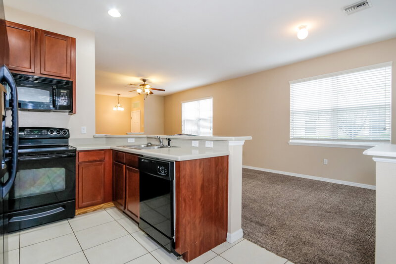 3,550/Mo, 8838 Moonlit Meadows Loop Riverview, FL 33578 Kitchen View 2
