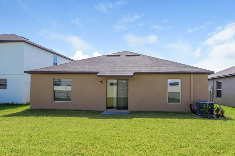 2,100/Mo, 15306 Miller Creek Dr Sun City Center, FL 33573 Rear View 2