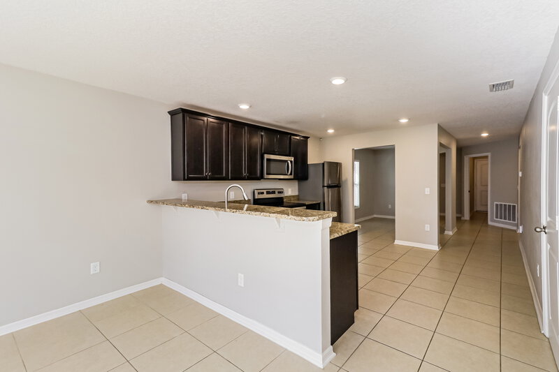 1,705/Mo, 8349 Silverbell Loop Brooksville, FL 34613 Kitchen View 2