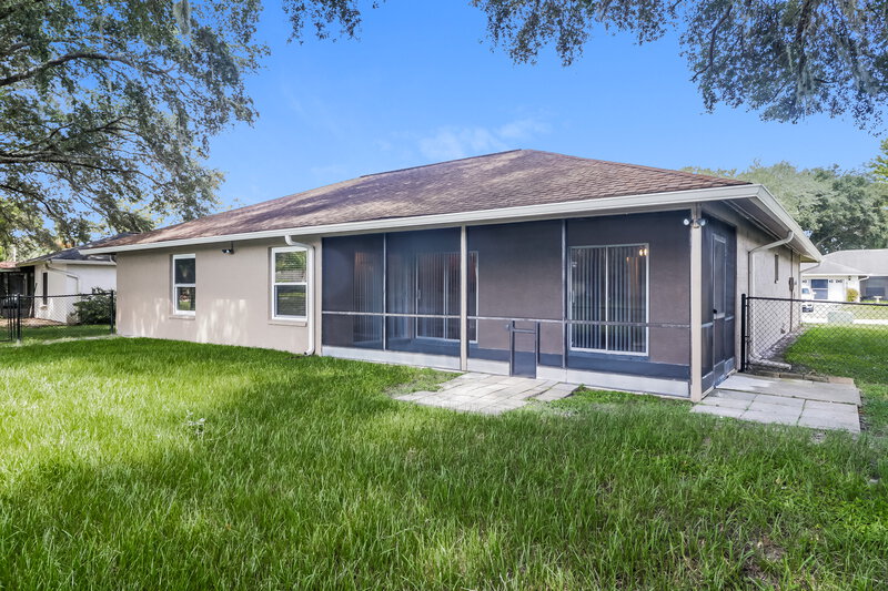 2,245/Mo, 1928 Tidewater Ct Zephyrhills, FL 33543 Rear View