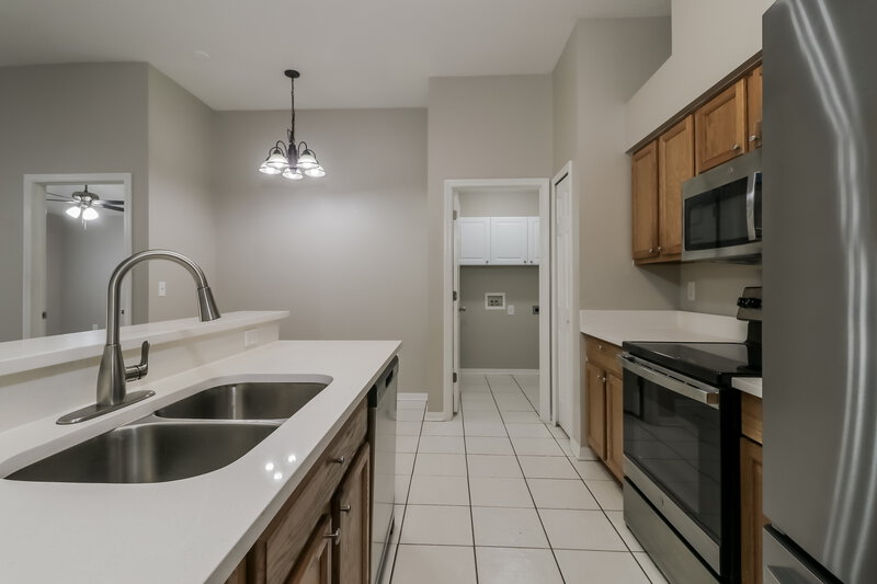1,995/Mo, 30511 Midtown Ct Wesley Chapel, FL 33545 Kitchen View 2