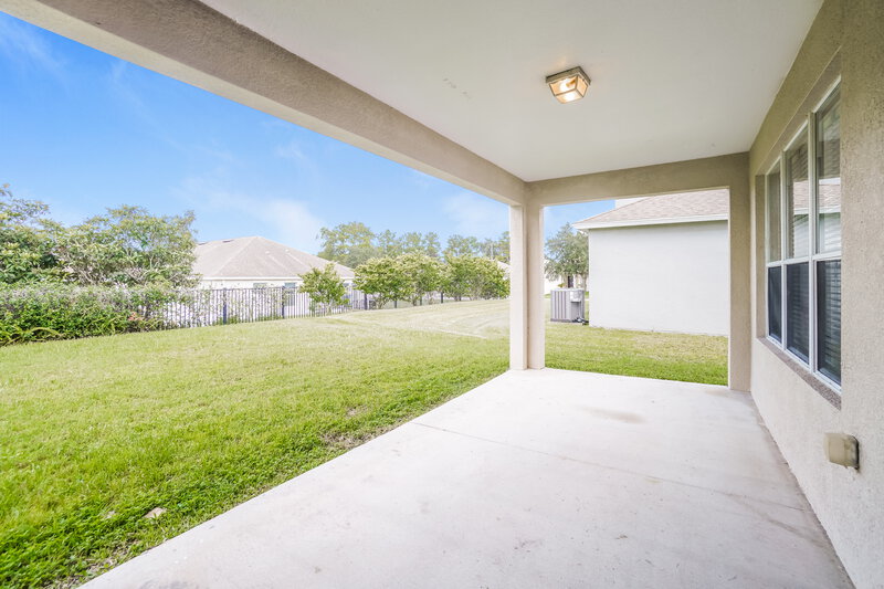 2,800/Mo, 7907 Outerbridge St Wesley Chapel, FL 33545 Covered Patio View