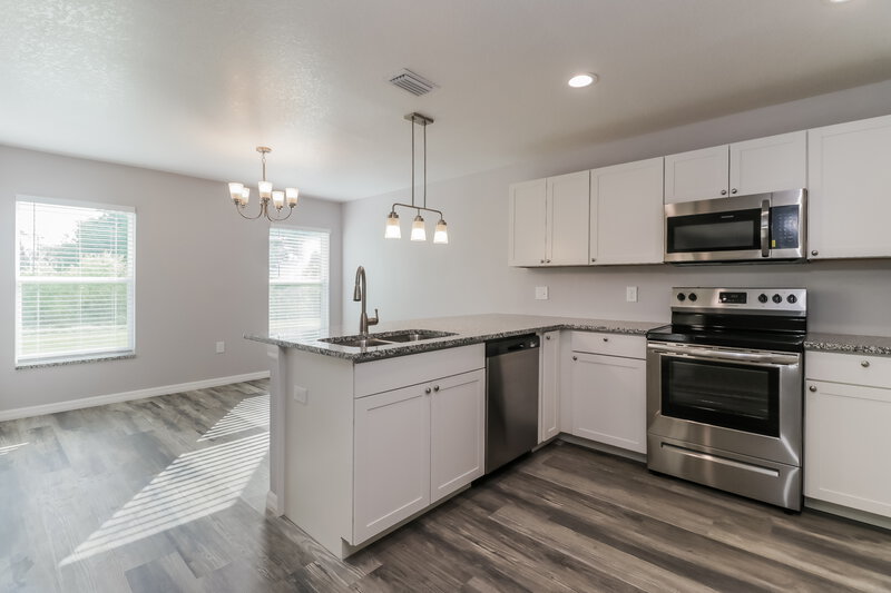 1,830/Mo, 5468 Chestnut Ridge Rd Dade City, FL 33523 Kitchen View 2