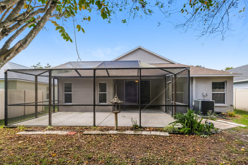 2,290/Mo, 7602 Citrus Blossom Dr Land O' Lakes, FL 34637 Rear View