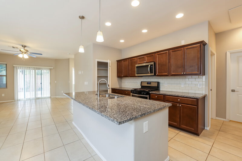 1,645/Mo, 876 E Bottomlands Ln Sahuarita, AZ 85629 Kitchen View 2